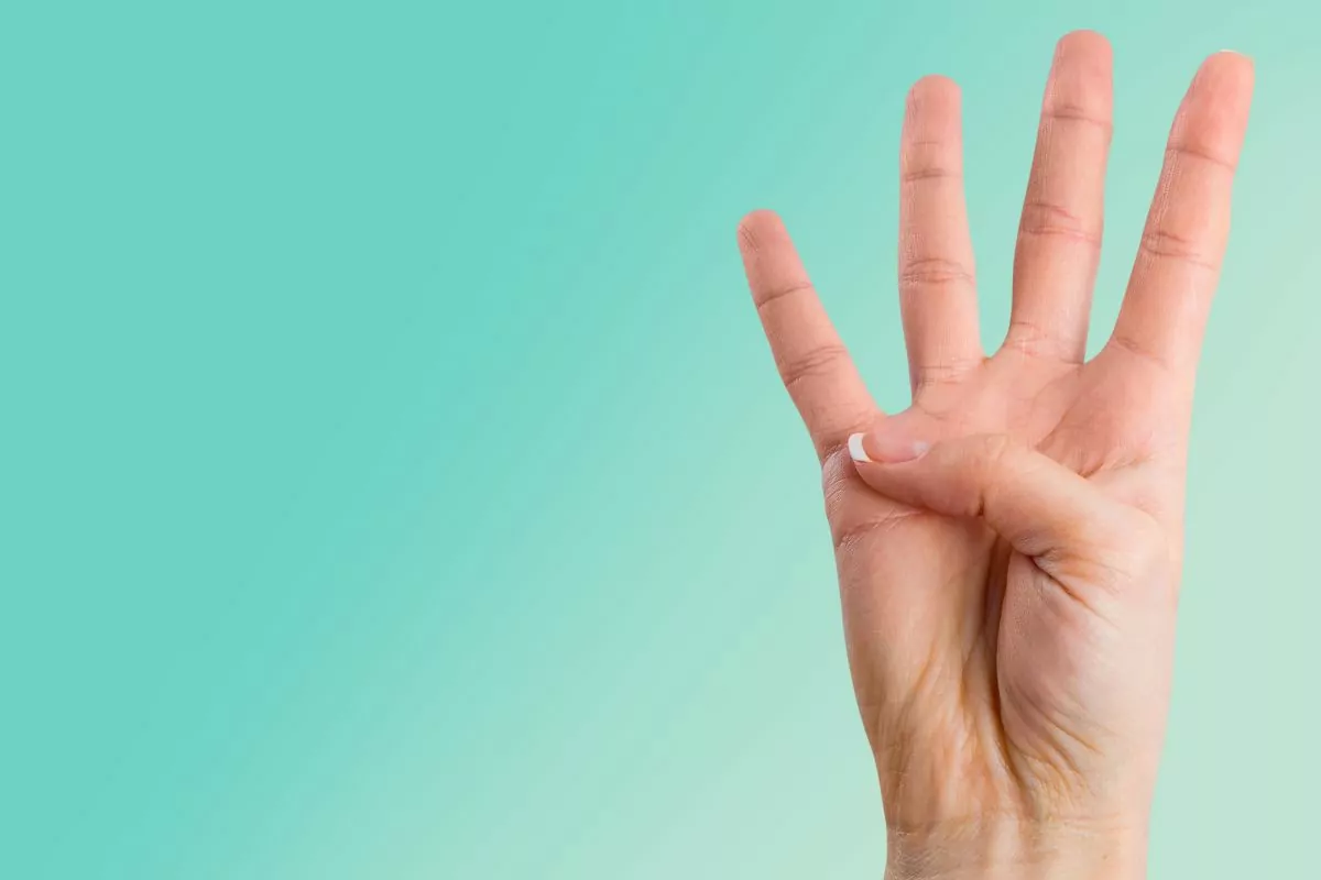 What Does Holding Up 4 Fingers Mean? (5 Common Meanings)